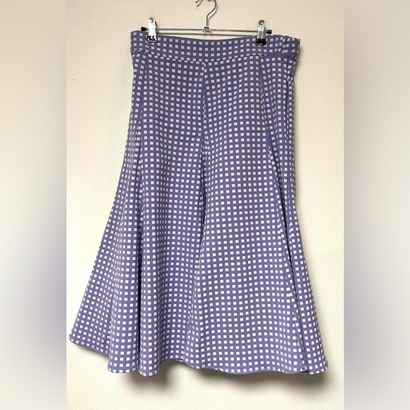 Eva Mendes A Line Skirt
Checkered Purple Plum Squares - Picture 3 of 7